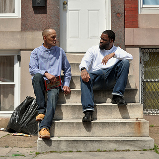 Friend of a Friend employees Mike Perry and Russell Green on Dolphin Street in Baltimore, near Perry's former residence.