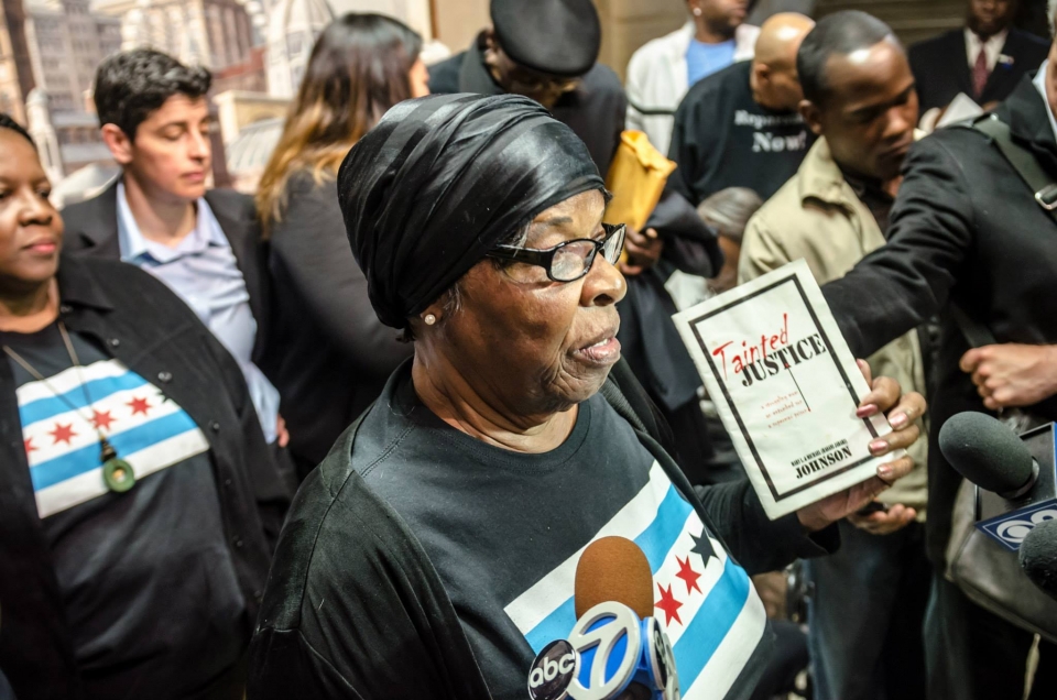 Mother of torture survivor Michael Johnson, Mary L. Johnson, speaks to the press after the City Council passes unprecedented reparations legislation. Photo: Sarah Jane Rhee