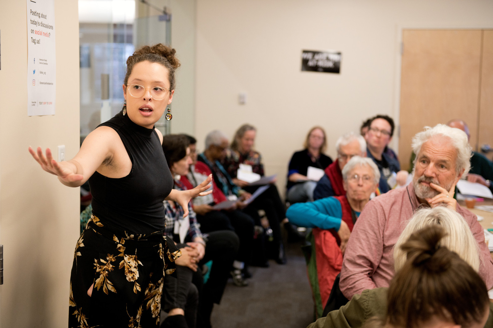 person instructing a group of people