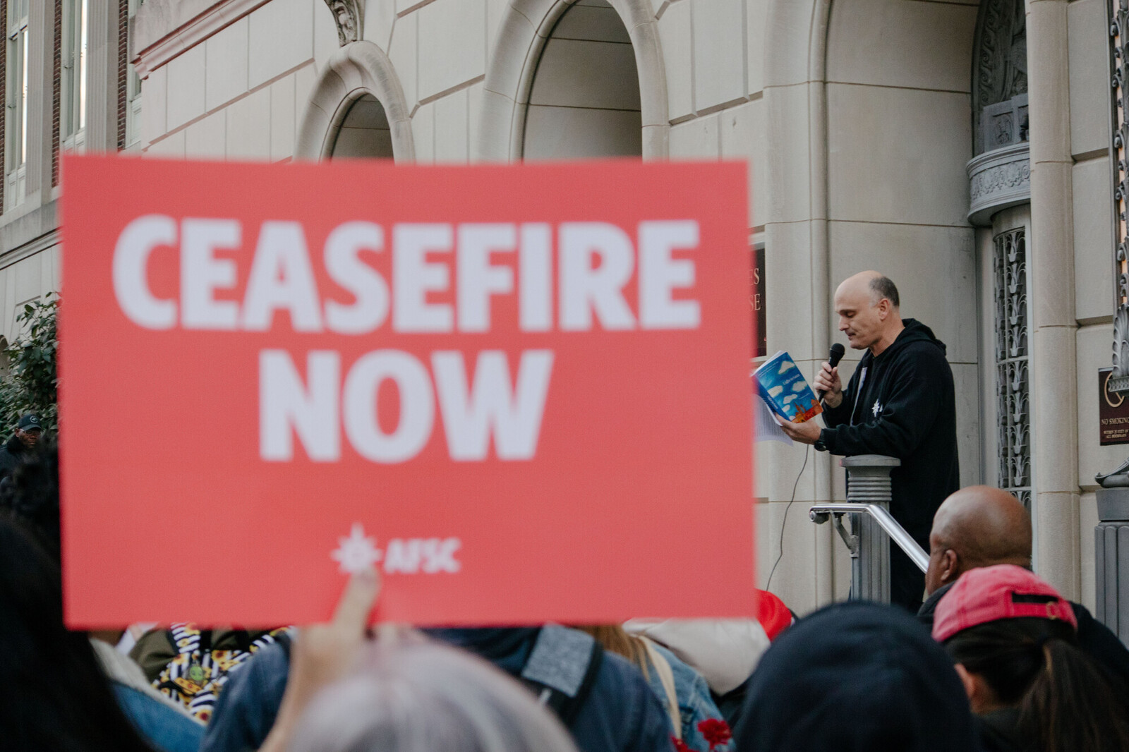 Close up of a ceasefire now sign at a rally in Philadelphia