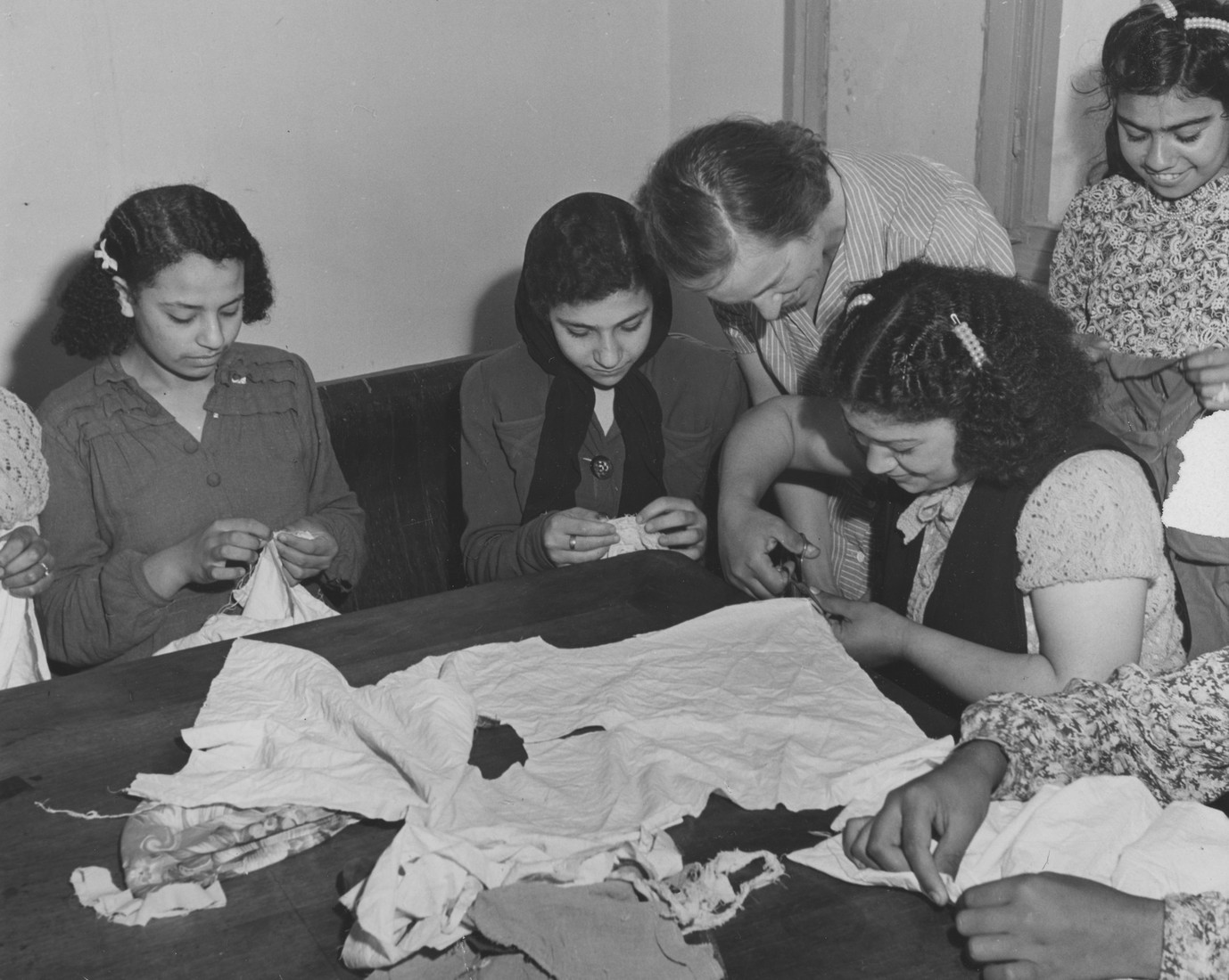 Women sewing at a table