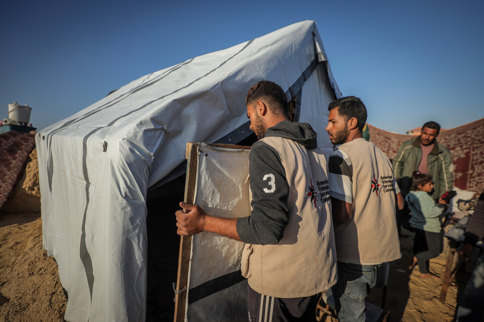 /sites/default/files/2025-04/pb_120205_repairing-a-tent-in-gaza-scr.jpg