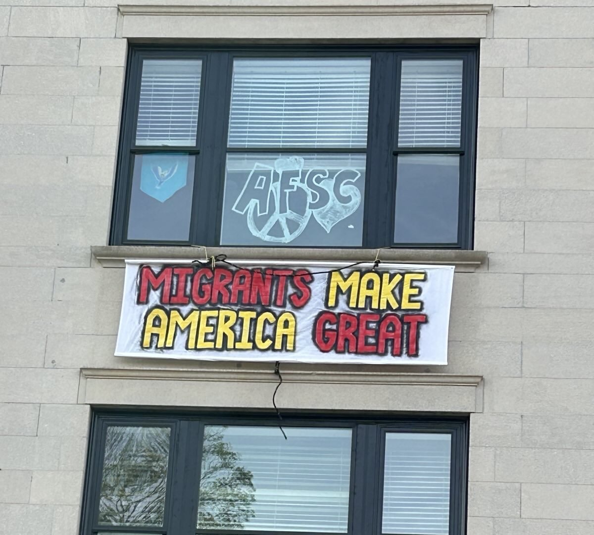 Sign hangs from window at 4 Park Street in Concord NH