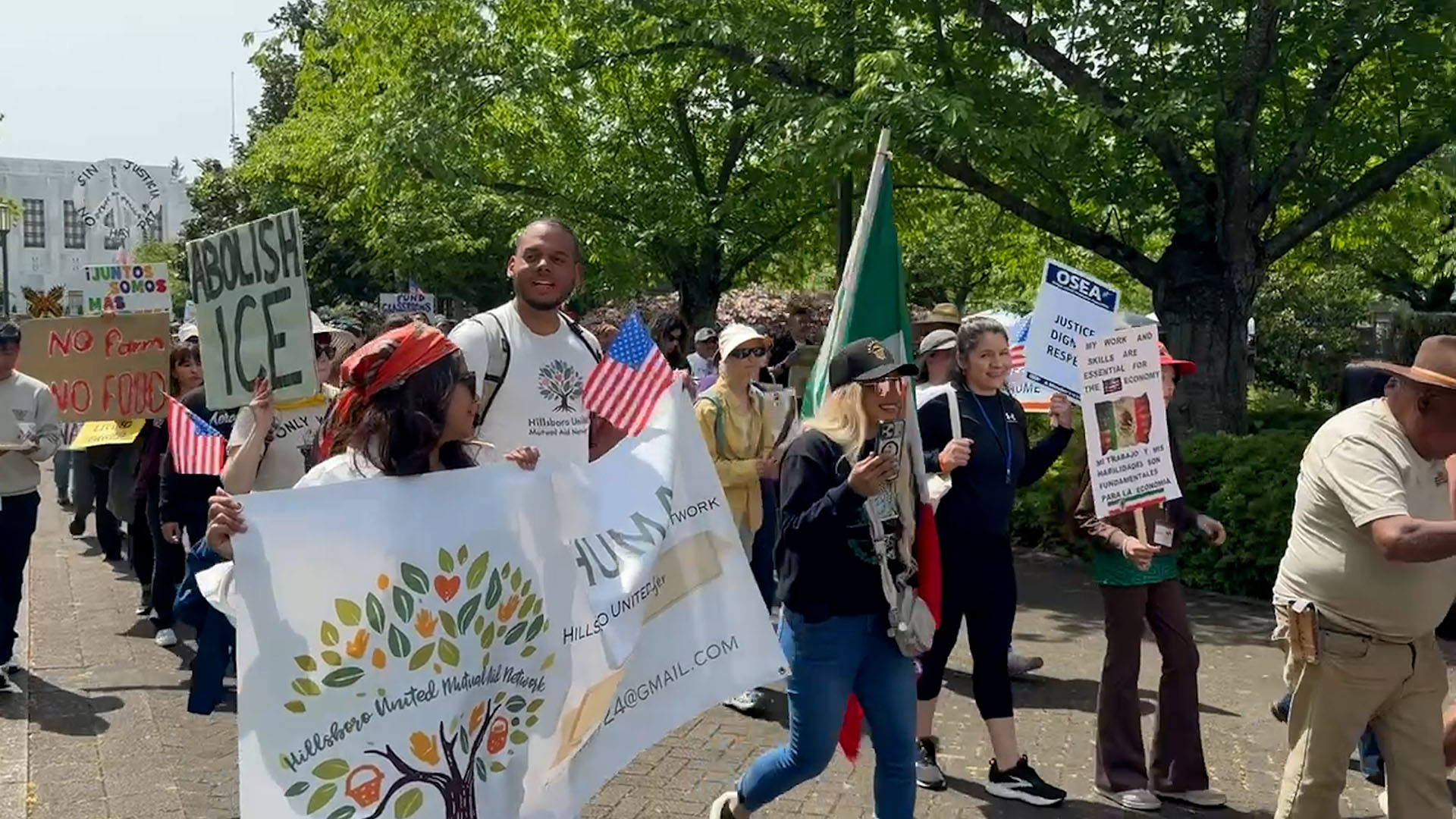 A group of protesters marching outside