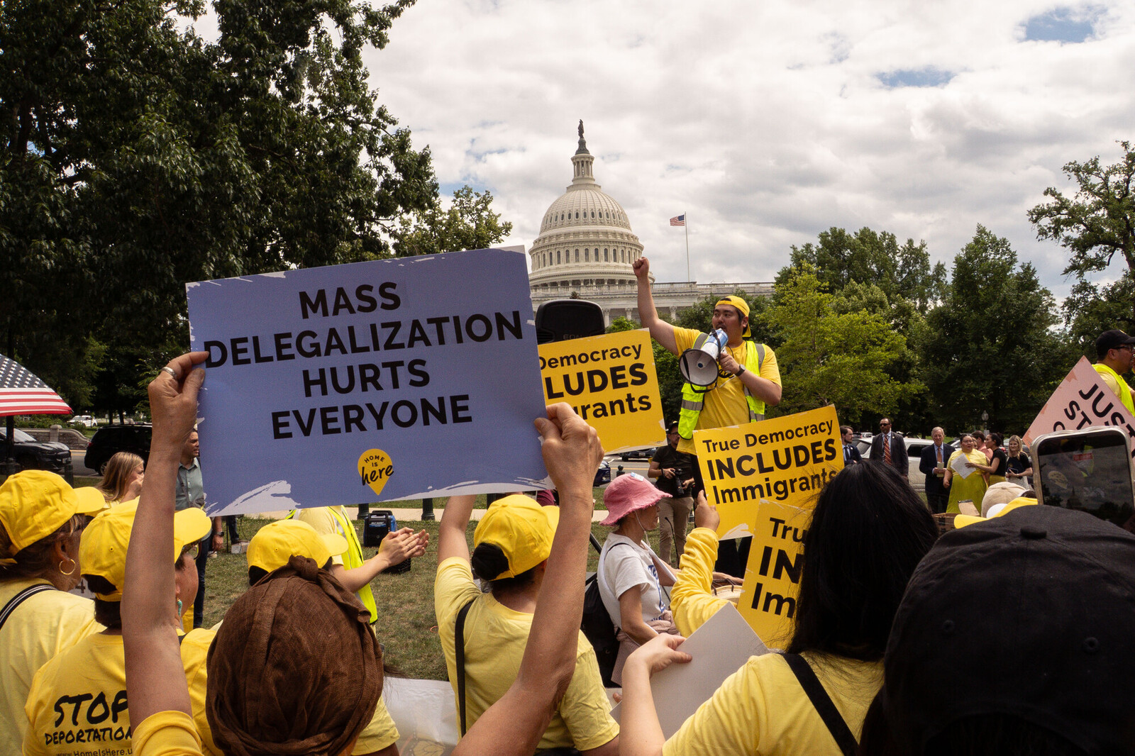 People hold up signs in Washington D.C. 