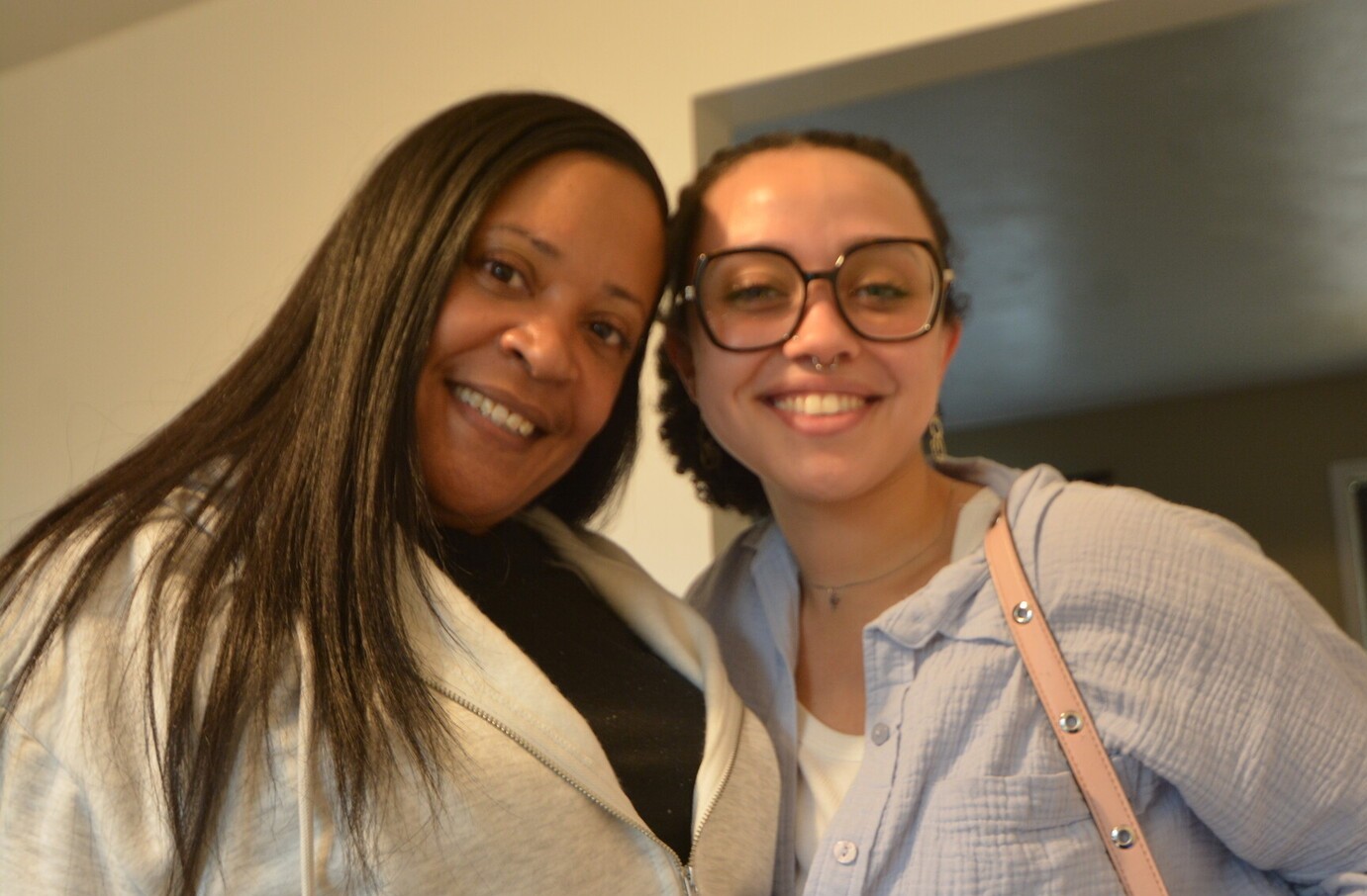 Quiana Lovett, left, with AFSC Michigan alum Adalia Kirby at a recent Healing Homes Farm Open House 