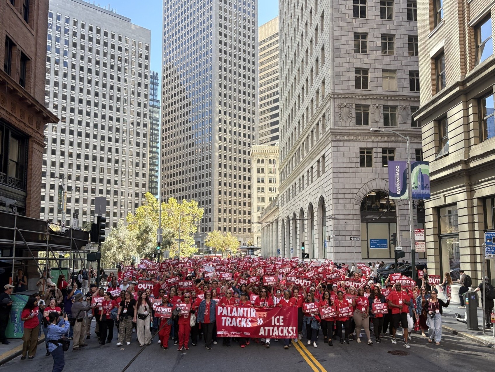 1500 US nurses march through a San Francisco to the ICE detention center