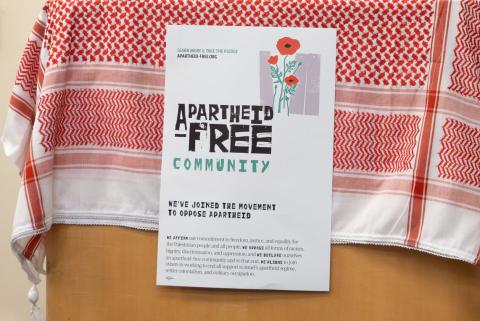 image of a poster that says apartheid-free