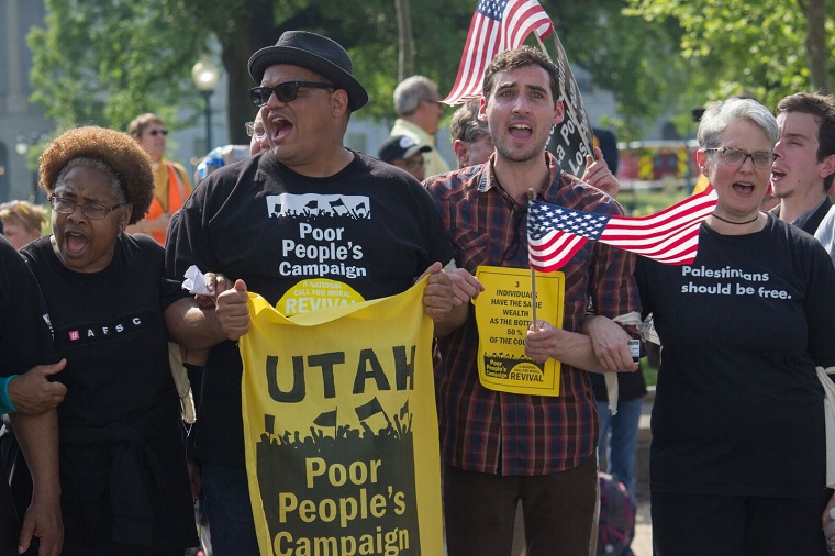 Protesting on first day of action of Poor People's Campaign in DC, photo by Carl Roose