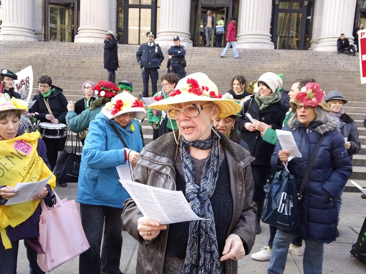 New York War Tax Resistors League action in 2013 with the Rude Mechanical Orchestra and Raging Grannies, photo by All-Night Images via Flickr CC