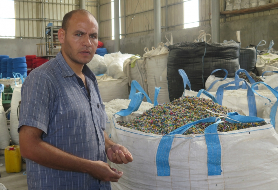 Factory owner Ismael Ramlawi and his brother, Naser (not pictured), worry they may have to close their business, since the blockade prevents them from getting materials they need to manufacture piping. Photo: AFSC/Mike Merryman-Lotze