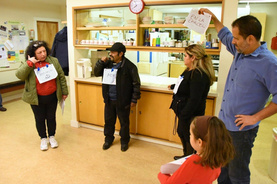 Workshop participants do role play to as part of their training on how to respond to immigration raids. Photo:AFSC/Portland 