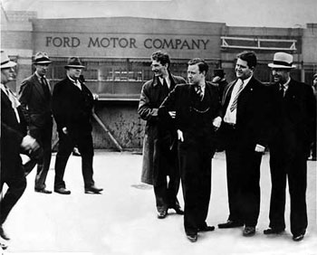 Reuther (third from right) at a worker strike at Ford Motor Company. Photo: Public domain