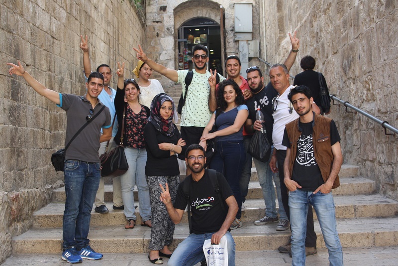 Young Palestinian participants from Gaza went on a tour in Jerusalem accompanied by our partner Pal Vision, after meeting with other participants from Israel and West Bank. Their meeting was held between 4-8 June 2015 in Nablus. For most of the Gazans, this is their first time out of Gaza and first time in Jerusalem too. The tour comprised of 14 Gaza participants who were awarded permits to exit Gaza. Unfortunately, a fifth participant, Yasser, was also awarded a permit to exit but was detained at the Israeli military checkpoint until further notice.