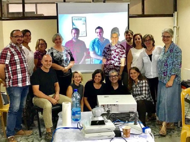 AFSC Israel/Palestine staff meeting in Ramallah (with Ali and Firas joining us from Gaza via Skype) // Photo credit: Brant Rosen