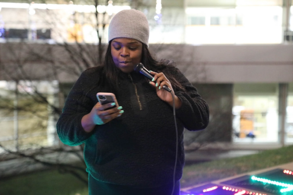 The author, Alicia Brown, speaks to the crowd. Photo: Isiah ThoughtPoet Veney 